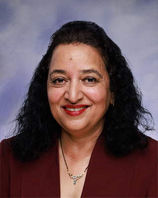professional headshot of Sudha Rani
